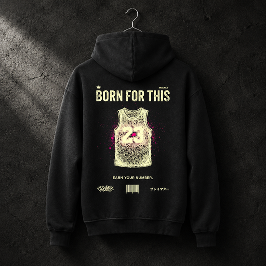 EARN YOUR NUMBER Hoodie am Metallbügel vor Betonwand